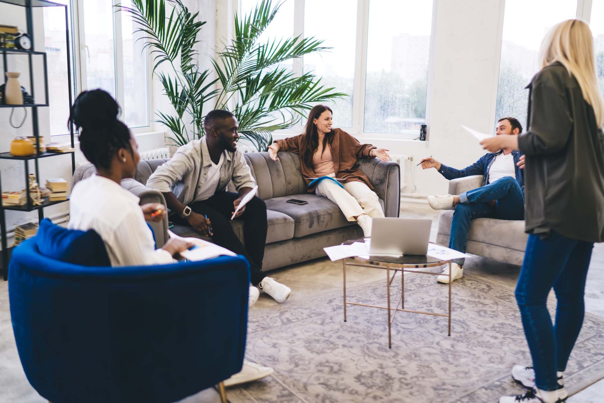 office refurbishment contractors, a group of colleagues discussing and brainstorming