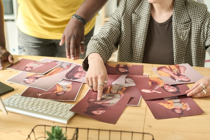 pvc advertising banners, a designer selecting pictures for banners