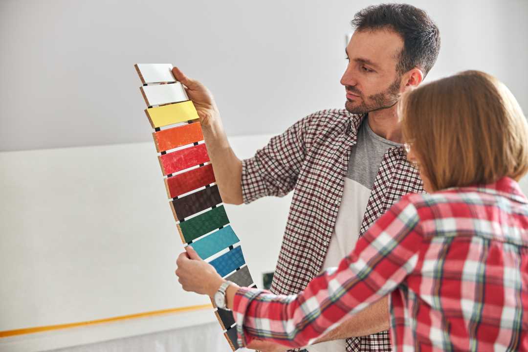 outdoor signage, 2 people choosing colours