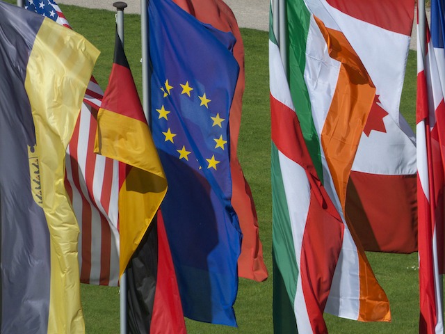 Benefits of sustainable flag materials, multiple country flags.