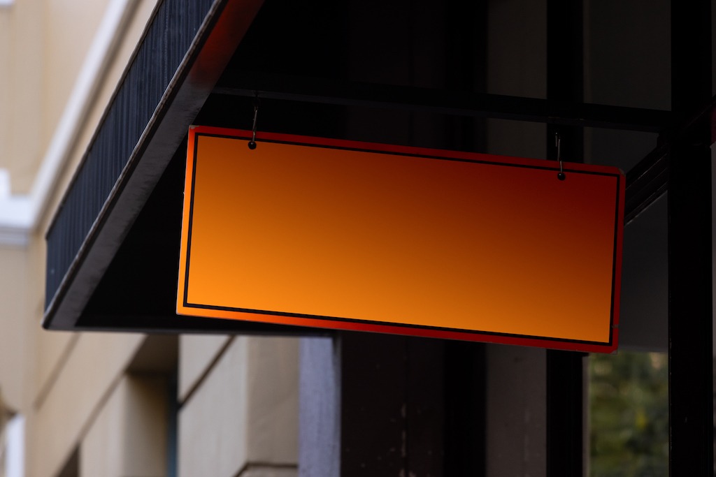 Scheduled Maintenance for Advertising Tools, shop entrance branding sign.
