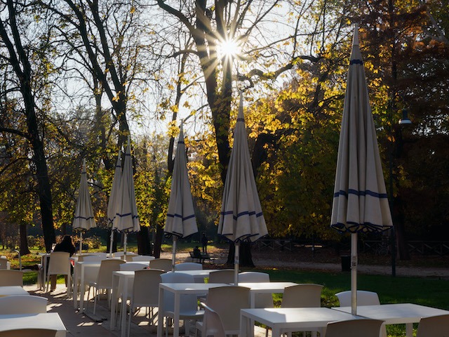 Choosing commercial parasols for pubs and restaurants, outdoor table parasols closed.