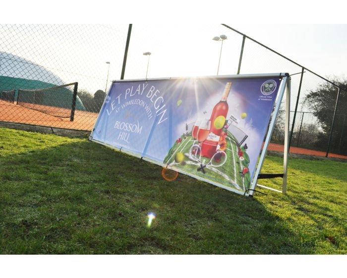 Outdoor event branding ideas, banner on a stand outdoors