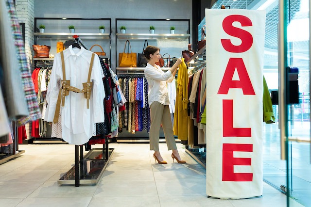 Retail Personalisation, woman shopping during a retail sale.