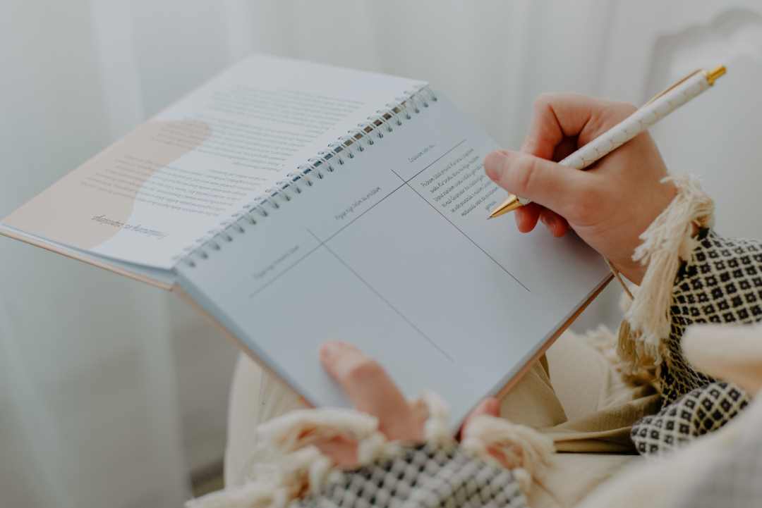 vehicle graphics, a woman writing on a notepad