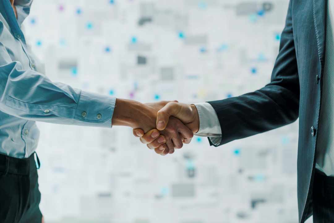 St. Patrick's Day celebrations, businessmen shaking hands