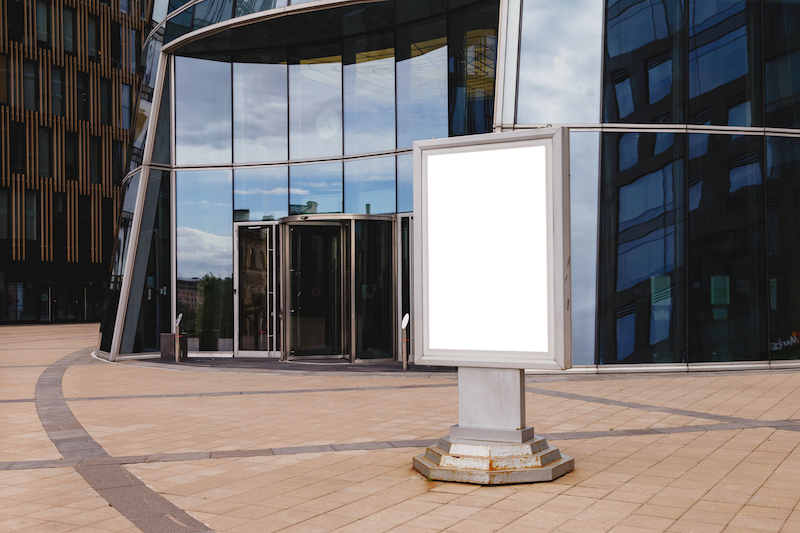 Commercial Property Advertising, small billboard near a commercial building.