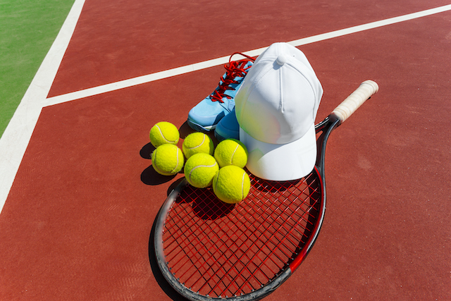 Sports apparel store, tennis equipment on court